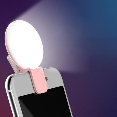 China Outdoor Mini Universal Led Selfie Light Ring Lamp Night For Mobile Phone Clip-On Selfie for sale