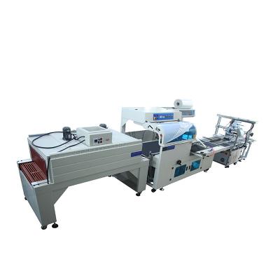 China Easy Operation Labeling Equipment Automatic Stick Label Heat Shrink Wrapping Packing Machine for sale