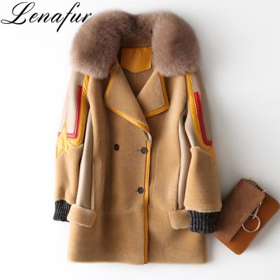 China Women's Anti-Shrink Lamb Sheep Fur Leather Shearling Jacket Stylish Warmer Coat With Fox Fur Collar for sale