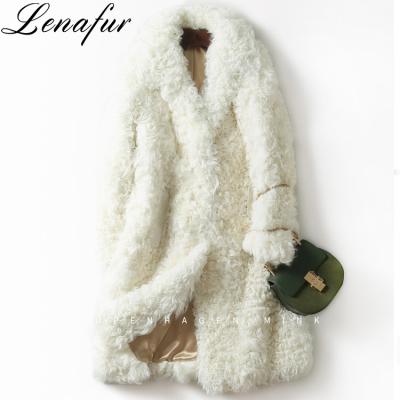 China Anti-Shrink Beige Long Thin Sheep Wool Curly Leather Shearling Wool Fur Coat For Women for sale