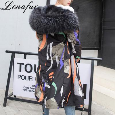 China 9 Anti-Shrink Long Real Colored Medium Raccoon Parka With Fur,Raccoon Fur Striping Trimming Fur Hooded Parka For Women In Winter for sale