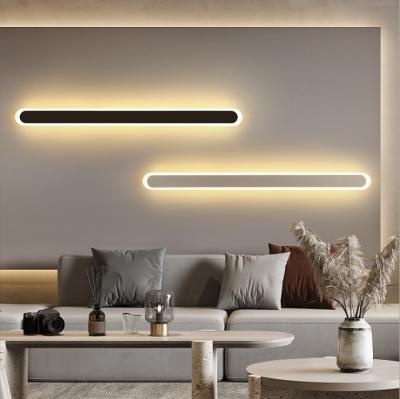 China Modern minimalist luxury creative linear bedside wall light bedroom background wall decorative warm minimal wall lamp for sale