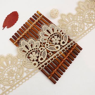 China Newest 2021 Fashion Gold Nigerian Guipure Lace Wax Trim African Luxury Water Soluble Lace For Women Dress for sale