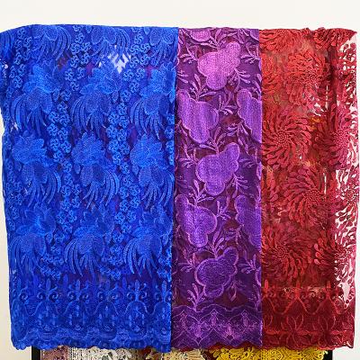 China Multicolor sequin lace fabric China factory embroidery mesh full frame Nigerian water soluble embroidery facric fabric for dress for sale