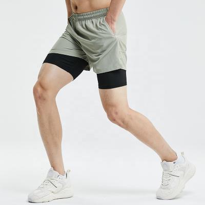 China 2022 Summer Anti-Wrinkle Double Layer Beach Shorts Custom Made Gym Mesh Sweat Running Shorts for sale