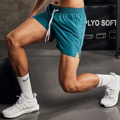 China Anti-Wrinkle Men's Quick Dry Swimming Shorts Custom Woven Running Shorts Sportswear Light Weight Gym Shorts for sale