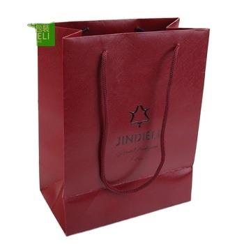 China Special Promotion Classic Paper Handbag With Handle For Packaging Empty Handbag for sale