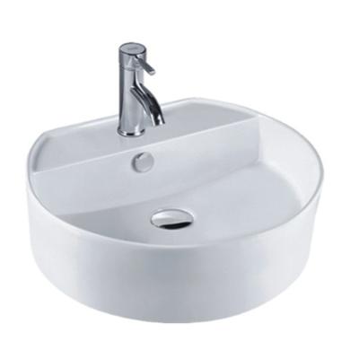 Cina Stylish single hole ceramic art round washbasin counter top bathroom hand wash basin sink in vendita