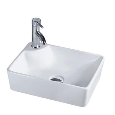 China Modern western white ceramic bathroom lavabo vessel sink above-counter art wash basin à venda