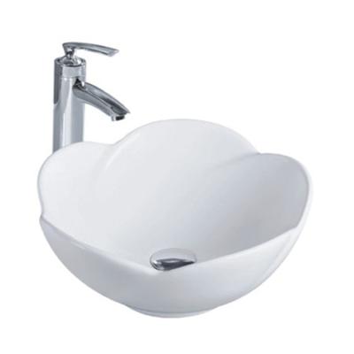 Cina Cheap price flower design ceramic counter top wc water washbasin hotel bathroom art basin in vendita