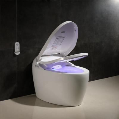 China Wholesale cheap white feet sensor remote control one piece toilet bowl ceramic human toilet for sale