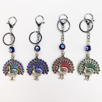 China Juno Backpack Pendants Key Chain Hanging Key Chain 4 Styles Evil Eye Bird for sale