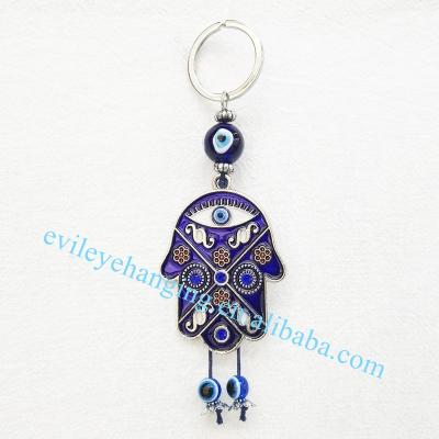 China Fatima Hamsa Keychain Hanging Evil Eye Blue Hand Keychain For Metal for sale