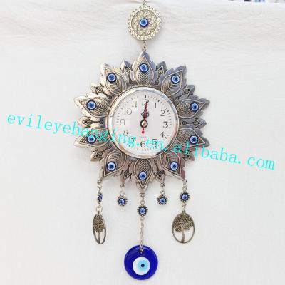 China Large Antique Sign Metal Clock Wall Hanging Decoration with Tree of Life Pendant Glass Evil Eye Handcrafted Bead for Home Decor Zinc Alloy for sale