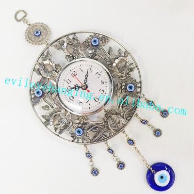 China Large Size Antique Sign Clock Wall Hanging Decoration with Handcrafted Evil Eye Glass Bead for Metal Souvenir Home Decor Decorative Clock for sale