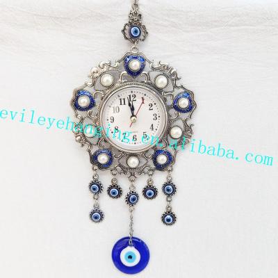 China Antique Sign Clock Beads Wall Hanging Decoration with Handcrafted Glass Evil Eye for Metal Souvenir Decor Home Clock for sale