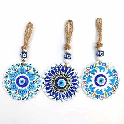 China Antique Imitation Turkish Tile Patterned Blue Amulet Wall Hanging Ceramic Evil Eye Home Decoration for sale