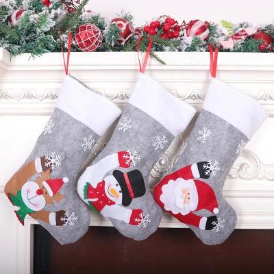 China DIY Decoration Christmas Stocking with LED Light Gift Bag Santa Snowman Reindeer Fireplace Christmas Tree Decorations Hanging Stocking for sale