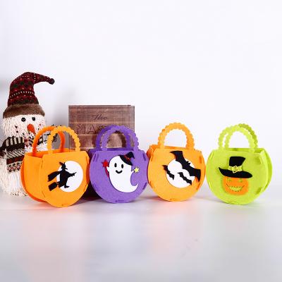 China Halloween Decorations Pumpkin Supplies Modern Carry Portable Bag Kids DIY Non-woven Handmade Gift Candy Bag for sale