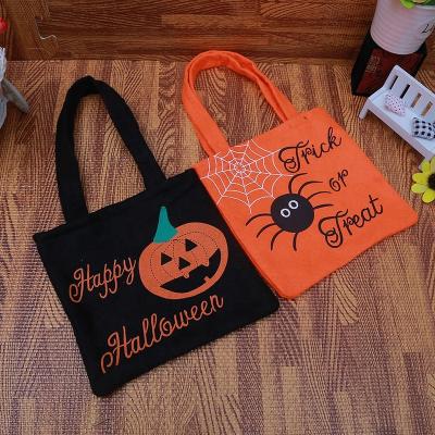 China Modern Portable Party Spirit Pumpkin Halloween Kids Nonwoven Candy Gift Bags Halloween Supplies Decor for sale