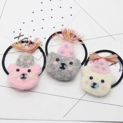 China DIY Christmas Decoration Snowman Wool Felt Push Up Accessories Cartoon Bear Hair Clip Brooch Material Accessories for sale