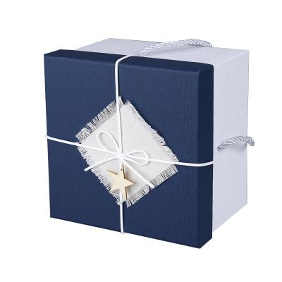 China Recyclable Rectangular Black Bow Sky And Earth Cover Custom Gift Box Cardboard Packing Box With Handbag for sale