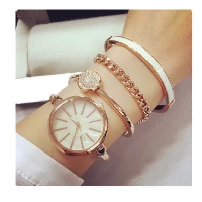 China Non-specific best-selling rose gold broom face crystal lady watch set beautiful all metal bracelet watch set bracelet watch set fashionable women for sale