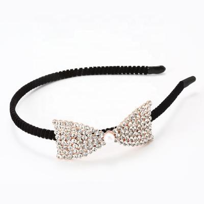 China Elegant charming most popularWholesale beautiful clear rhinestone metal flower headband for sale