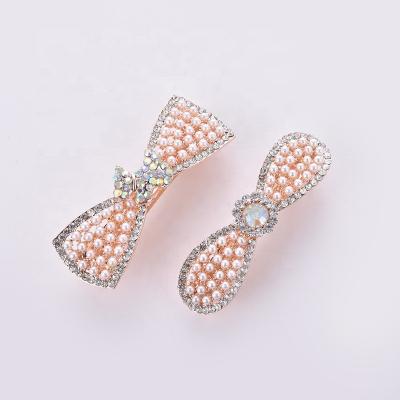 China Fashion hair accessories small pearl beads adorn elegant wedding hairpins in the form of pearl bows for sale