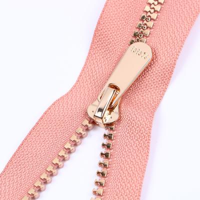 China Sustainable Logo Zipper Pulls Zipper Puller Rubber Rainbow Nylon Zipper for sale