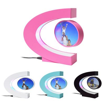 China Customized Wholesale Luxury Logo Levitation Rotation Photo Picture Frame Fashion Clear Crystal Acrylic for sale