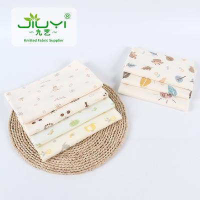 China Custom double faced printed christmas comed brushed pure cotton fabric printed for baby clothing for sale