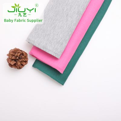 China Sustainable Wholesale Solid Dyed Knitted Kids Rayon Spandex Jersey Fabric Rolls for sale