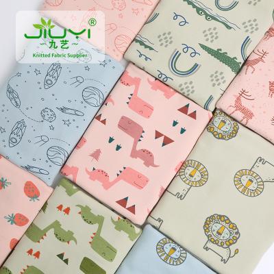 China Soft Custom Pattern Eco - Friendly Organic Kids 95% Cartoon Wool Cotton Interlock Fabric for sale