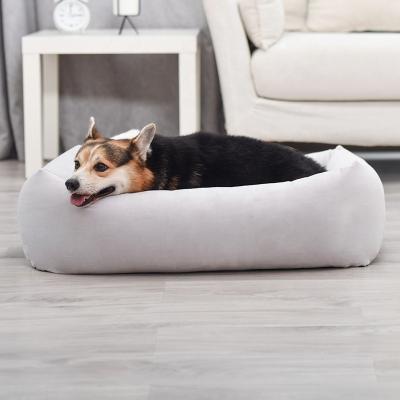 China Travel Rectangle Dog Bed Soft Velvet Fabric Pet Bed For Dogs And Cats With Non Slip Bottom for sale