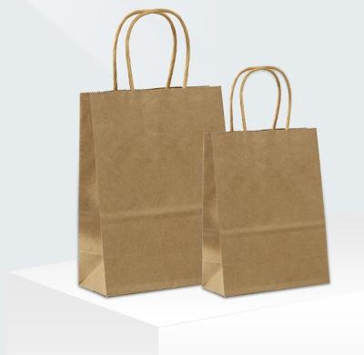 China Wholesale Customized Recyclable Recyclable Logo Brown Kraft Paper Shopping Bag With Twisted / Flat Handle for sale