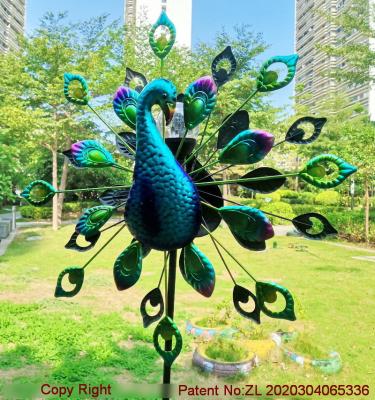 China Kinetic Animal Shape Wind Spinners Bird Peacock Ornaments Outdoor Garden Metal for sale