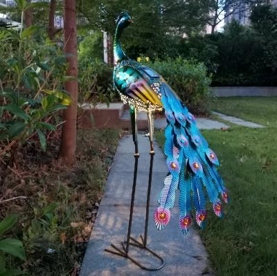 China Ornamental Peacock Sculpture Hand Paint Metal Outdoor Decor Led Solar Light Garden for sale