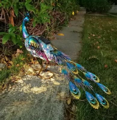 China Painting Animal Line Hand Metal Peacock Light Shape Solar Lawn And Garden Product for sale