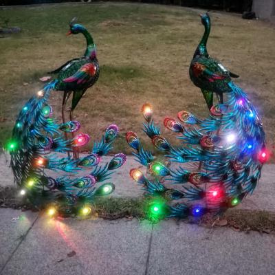 China Hand Painting Peacock Handmade Decorations Solar Powered Garden Ornament for sale