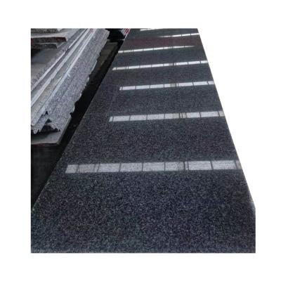 China Modern Light black G654 Chinese manufacturer direct selling flat natural granite stone polishing surface for sale