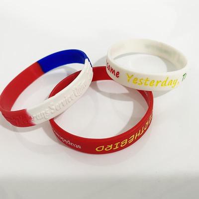 China Wholesale cute OEM new design character custom design debossed printed color silicone wristband with promotional gift for sale