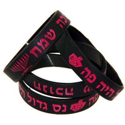 China New Logo Style Promotional Kids Durable Customized Silicone Black Wristbands With Charm Logo for sale