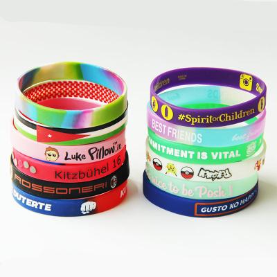 China Free sample durable no hotting minimum sale country flag silicone wristband custom debossed wristband for sale