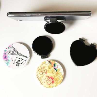 China Cheapest universal adjustable multifunctional makeup mirror price design sticker mobile phone back bracket for sale