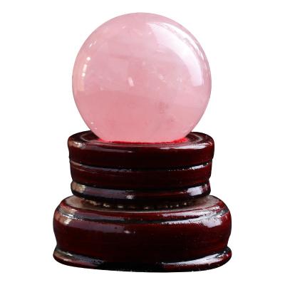 China Europe Wholesale 3-15cm Natural Pink Healing Crystal Ball Rough Polished Home Decoration for sale