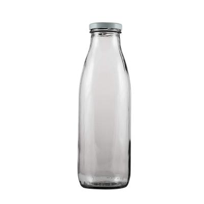 China 1000ml Eco-friendly Glass Milk Bottle Beverage Bottle With Reusable White Lids And Straws for sale