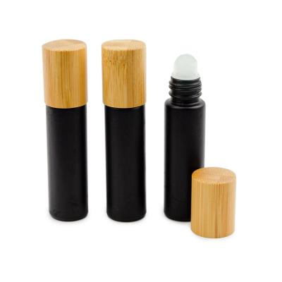 China 10ml Bamboo Black Frosted Glass Rollball Eco - Friendly Bottles With Glass Rollers For Essential Oil Blends for sale