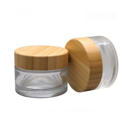 China Eco - Friendly Glass Cream Jar With Environmental Bamboo Lid 30g Frosted Cosmetic Jar Glass for sale