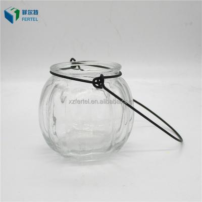 China 200ml Eco - Friendly Pumpkin Shaped Unique Glass Christmas Candle Jars for sale